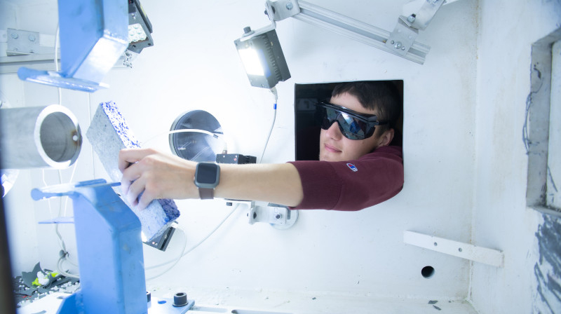 Science student conducting an experiment. 