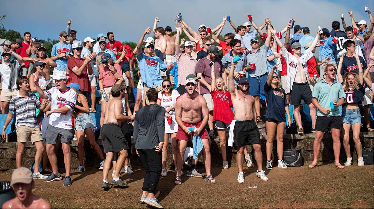 The Ole Miss student section in right field celebrates a homerun during a baseball game at Swayze Field.