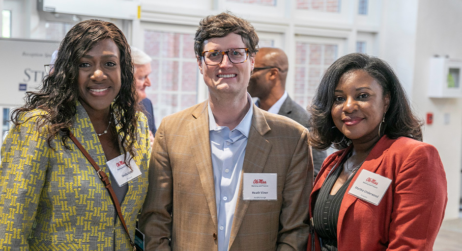 Attendees of business school symposium