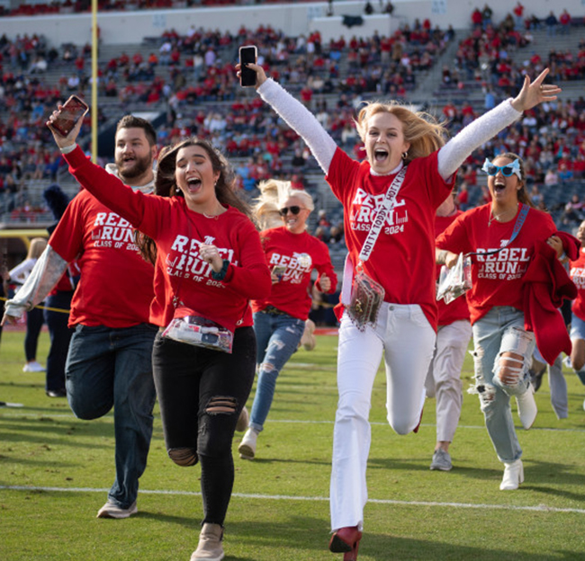 Freshman class storms the field at Rebel Run