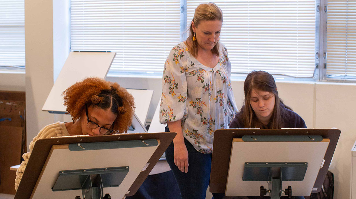 Fuqua with students in drawing course