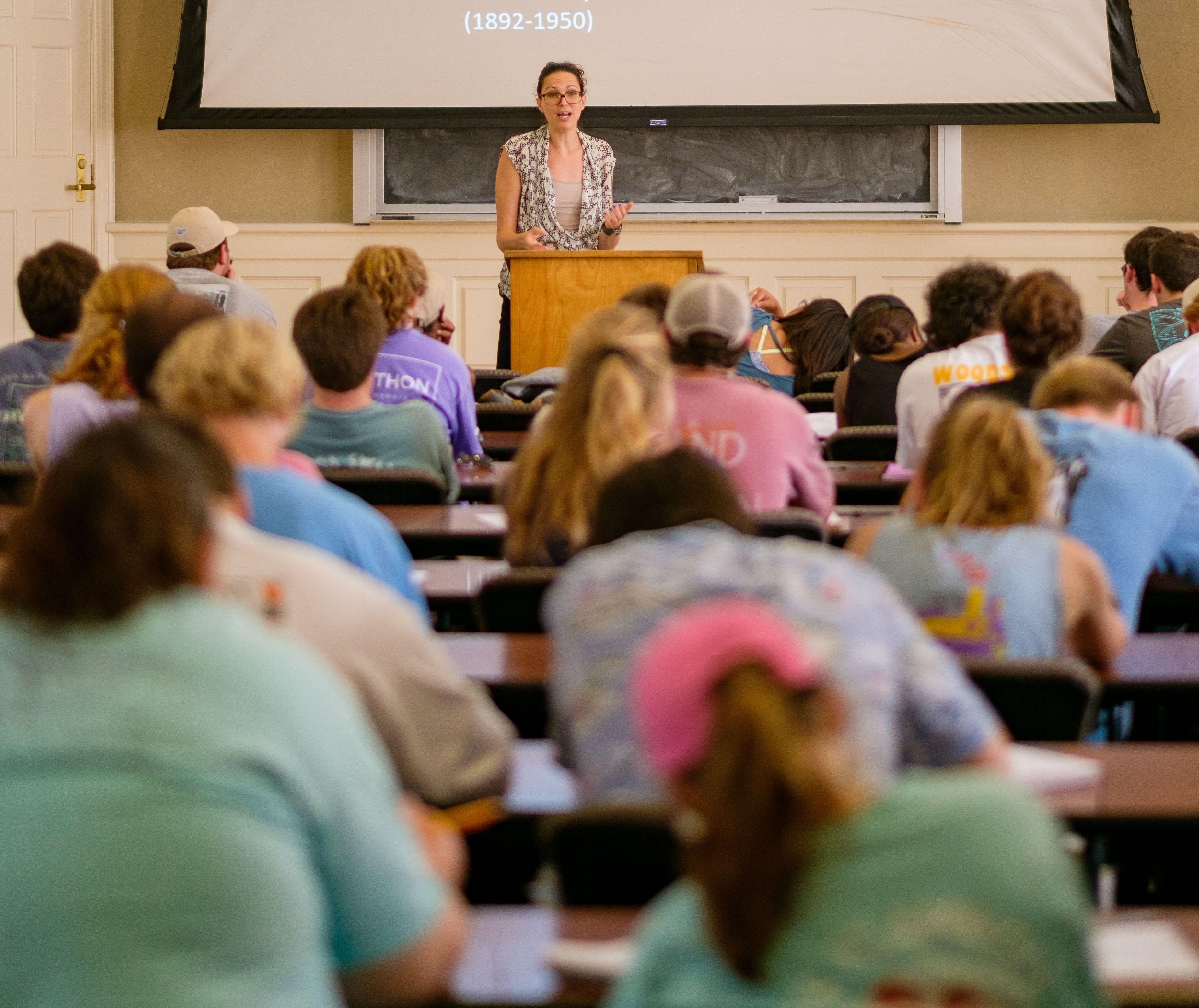 Students sitting in the large conference room in Bondurant attending a lecture on literature