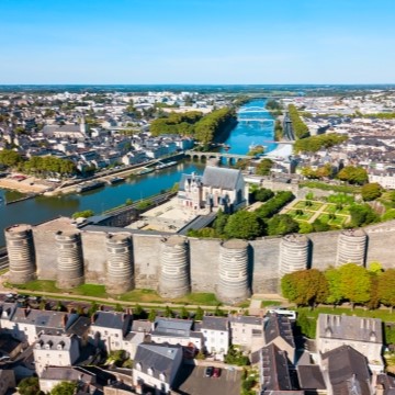 aerial photograph of Angers, showing the castle walls and a river