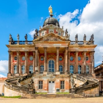 Historic baroque building in Potsdam with statues and great ornamentation 