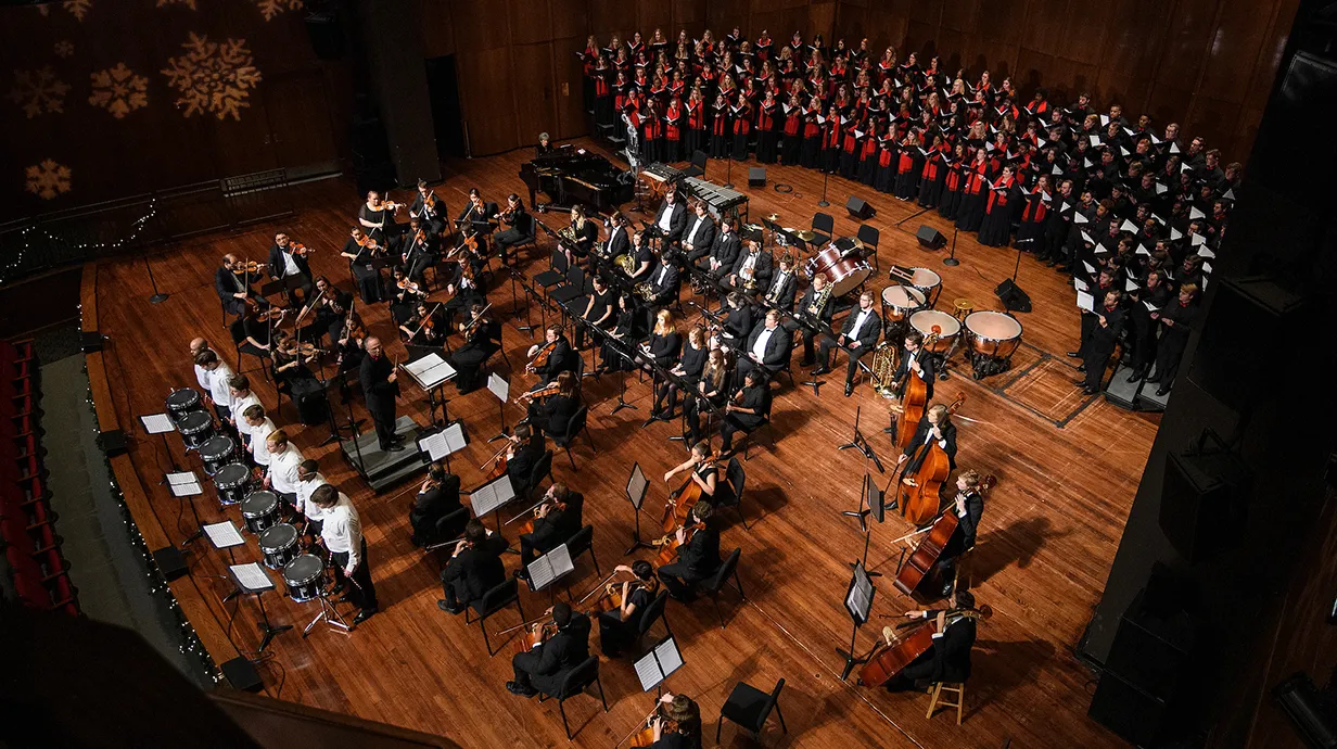 Roughly 100 concert performers on stage