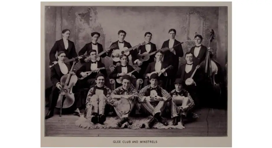 an archival photo of a yearbook from the 1920's featruing the glee and minstrel performers