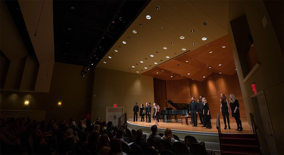 Side view of performers on the Nutt Auditorium Stage