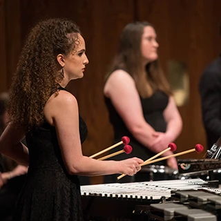 Band member plays percussion