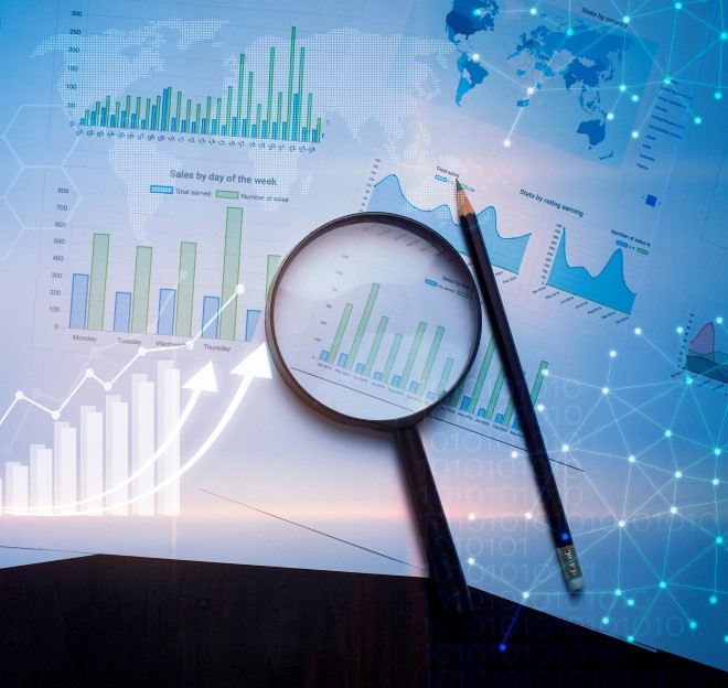 image of collage of data charts along with magnifying glass and pencil