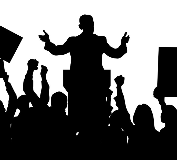 drawn image of a silhouette of a leader standing at a podium in front of a crowd