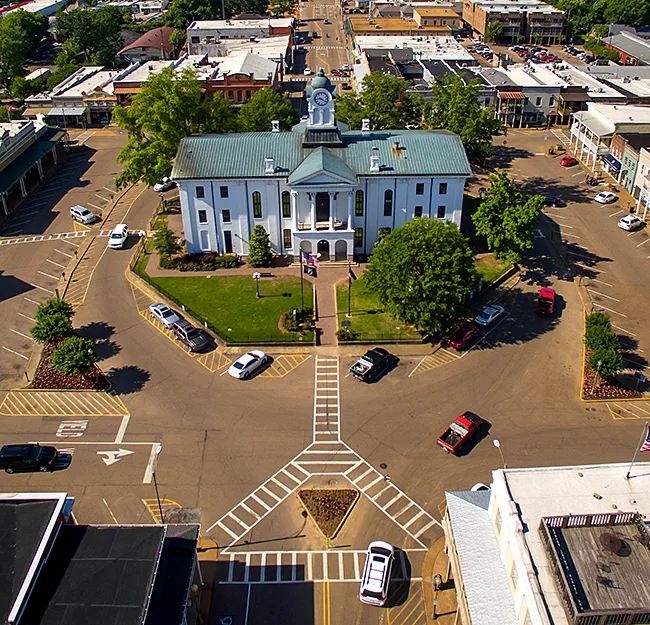 Aerial view of Oxford, MS square. Courthouse is featured in middle.