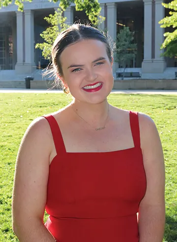 Portrait of Sarah Austin Welch outside near the Ole Miss grove.