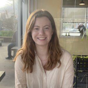 astrid knox mcconnell portrait taken outside in front of storefront