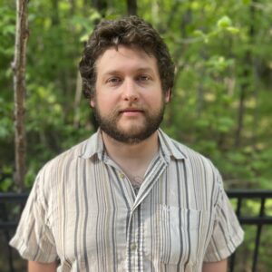 portrait of garrett fuller standing outside