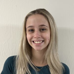 portrait of Gracie Meister in front of white wall