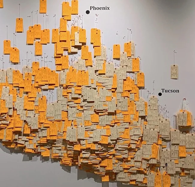 yellow pages plastered on a wall