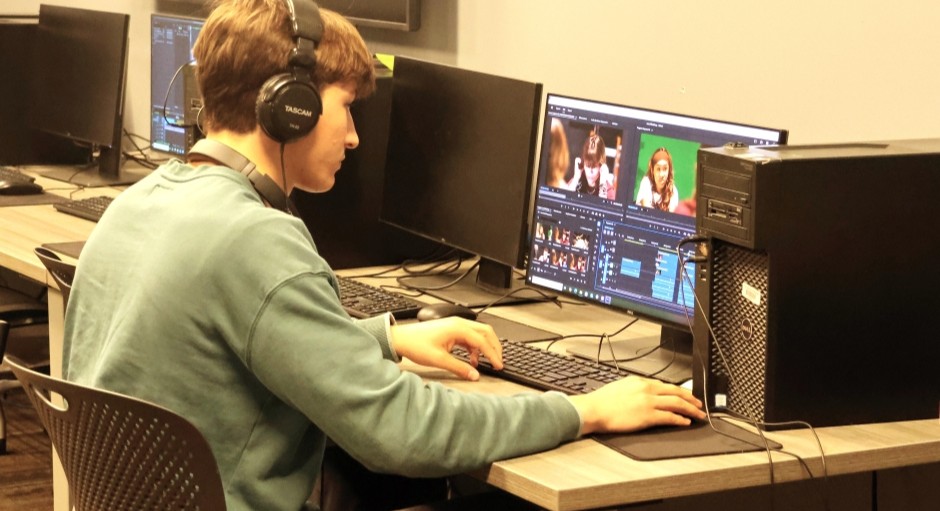 student working at a computer