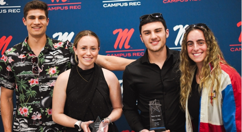 Student employee receiving award.