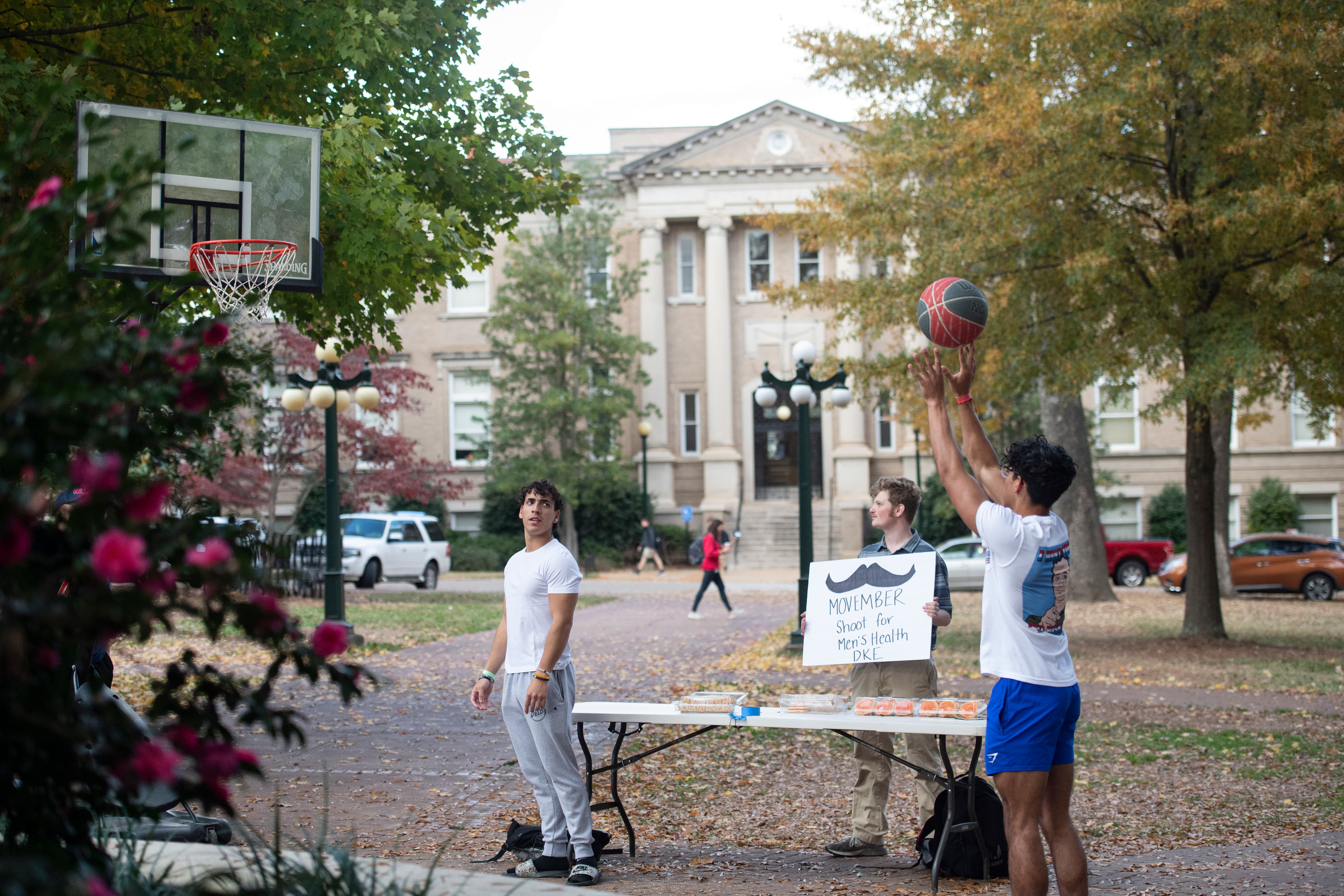 men playing basketball