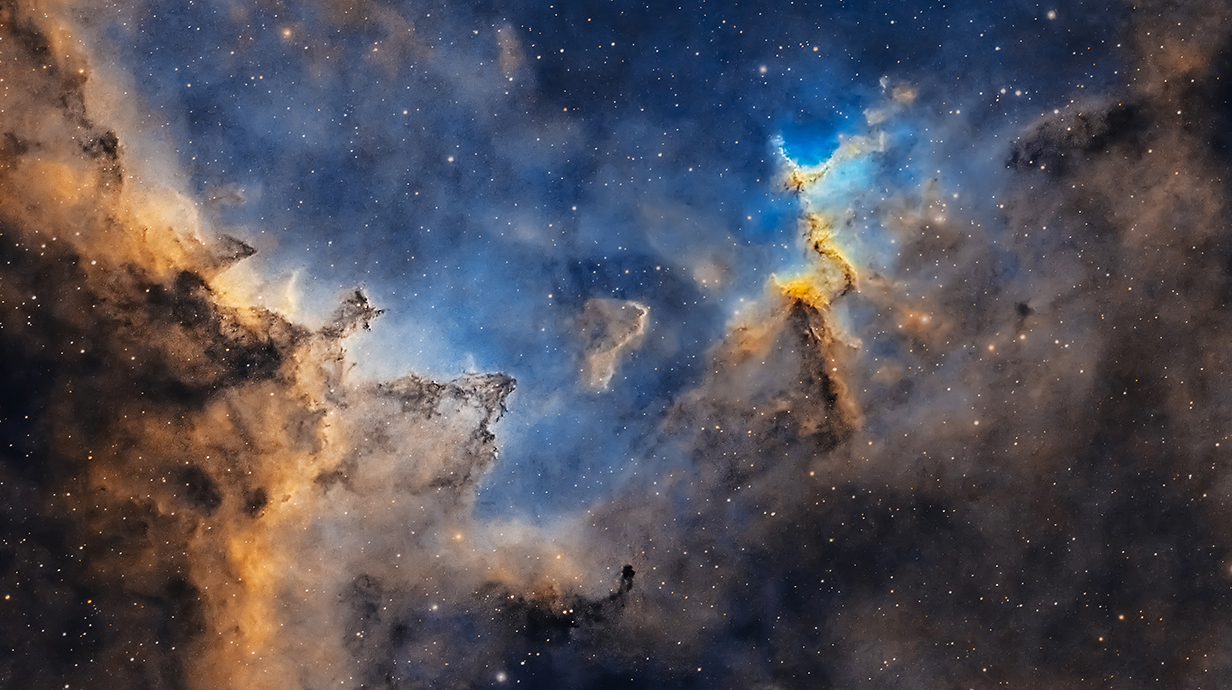 Astrophotograph of a nebula in deep space.