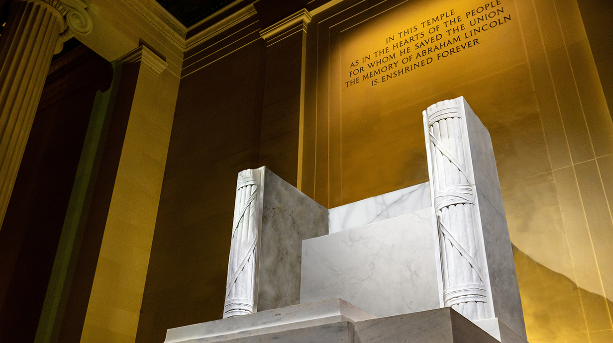 A photo illustration of the interior of the Lincoln Memorial depicts the chair as empty, without the seated figure of Lincoln.