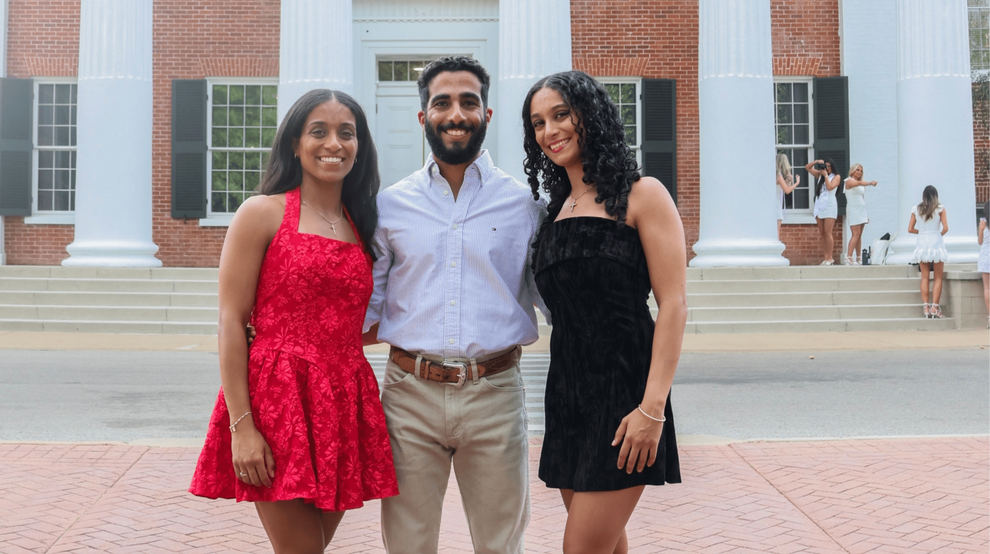 An image of Elizabeth, Michael, and Sarah Basha outside of the Lyceum.