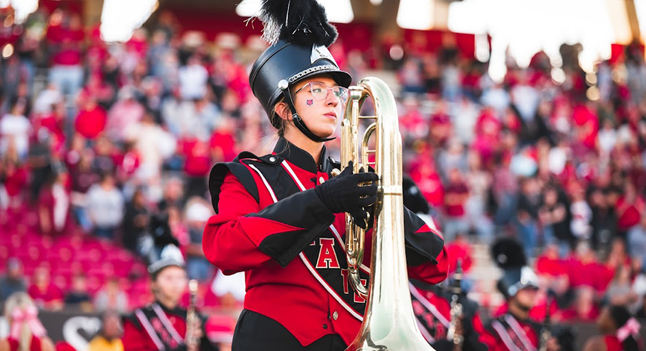 Sydney Rush marches in uniform at Arkansas State.