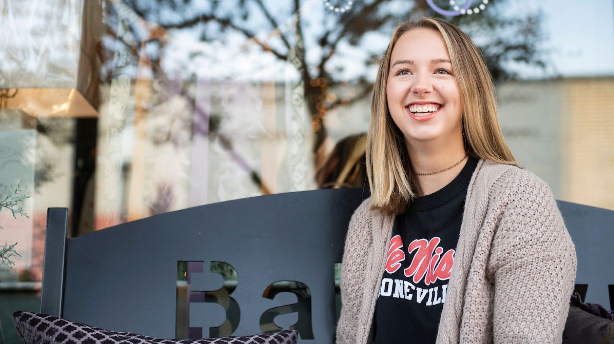 Elementary Education instructor smiling at student 