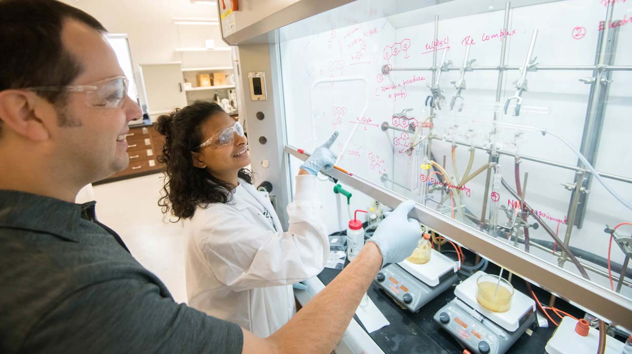 Professor and student in lab 