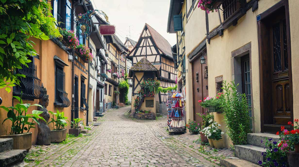 French town with cobblestone streets.