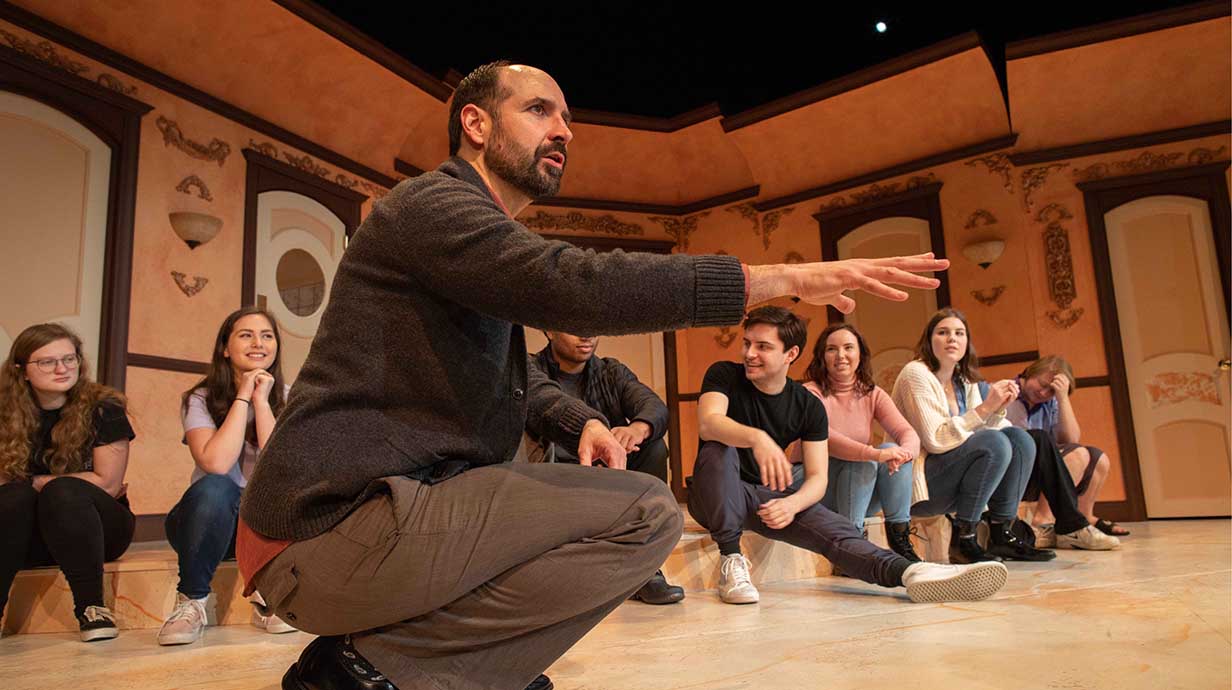 Ole Miss theatre students take direction from a member of faculty during a rehearsal.