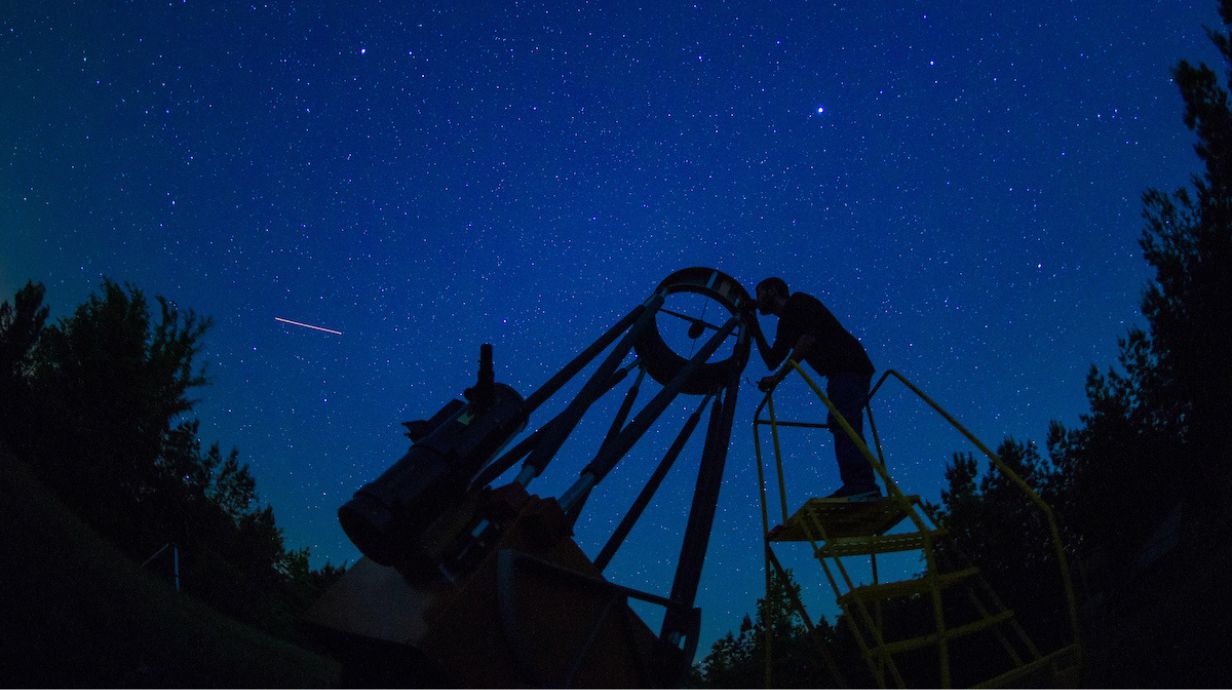 Astronomer looking at the stars.