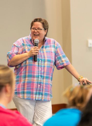 Dr. Jaime Harper talks to students. 