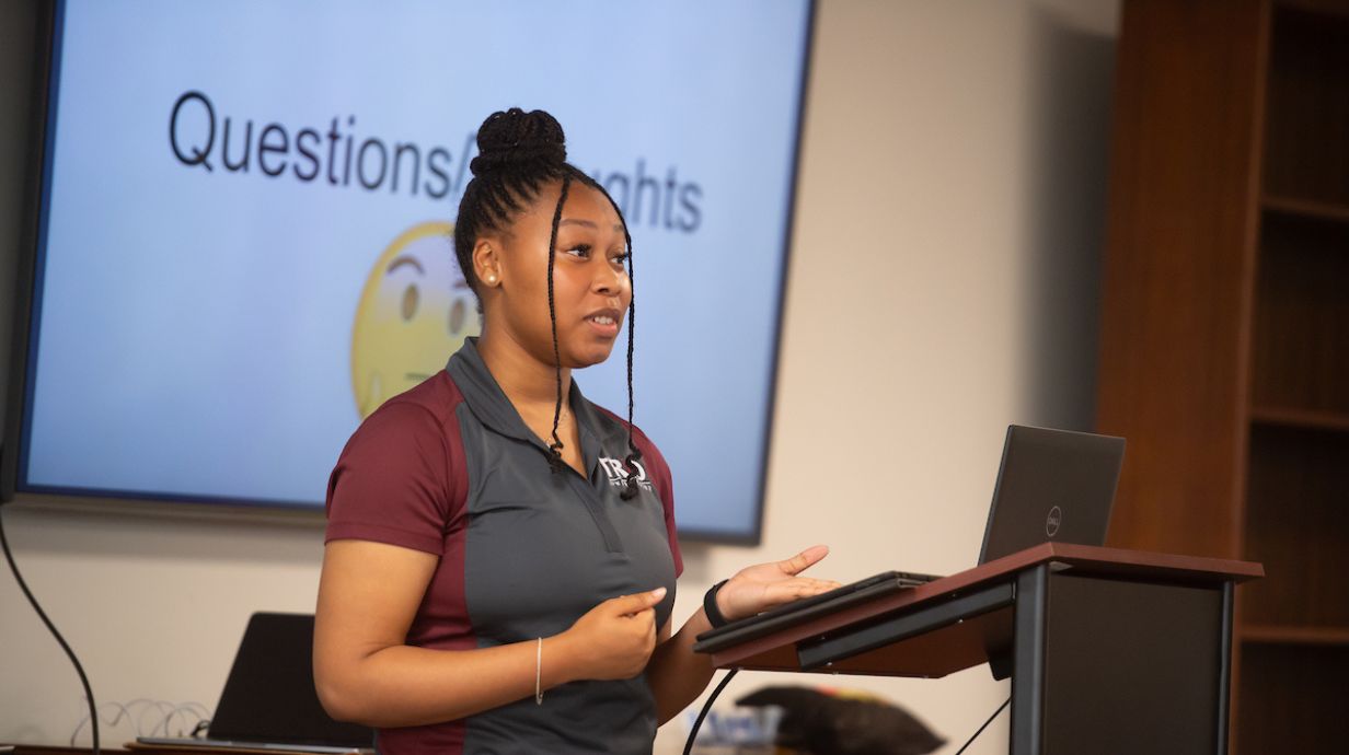 A Mississippi Highschooler gives a presentation as part of a summer class on Community Engaged Leadership.