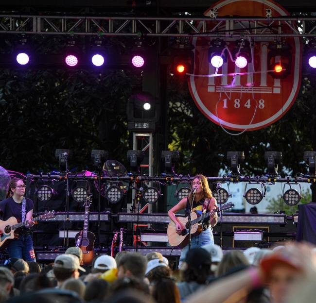 A musician performs during a concert at the Grove stage.