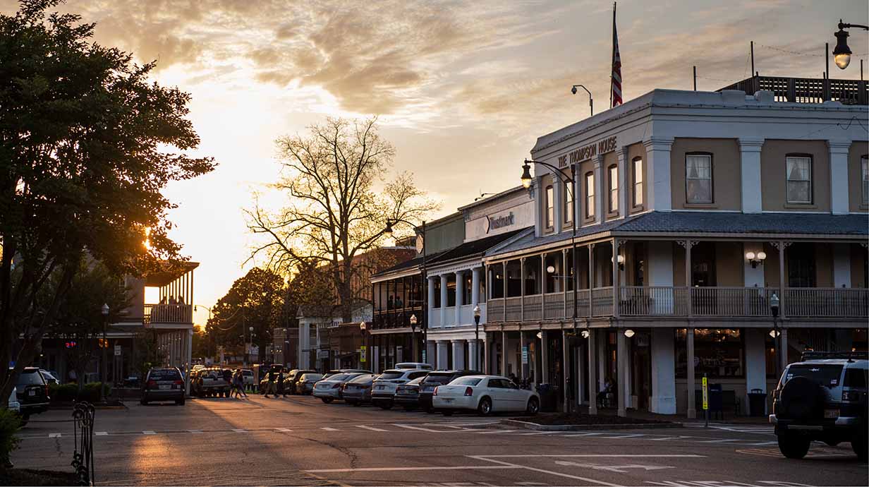 The sun sets over the Oxford Square in the evening.