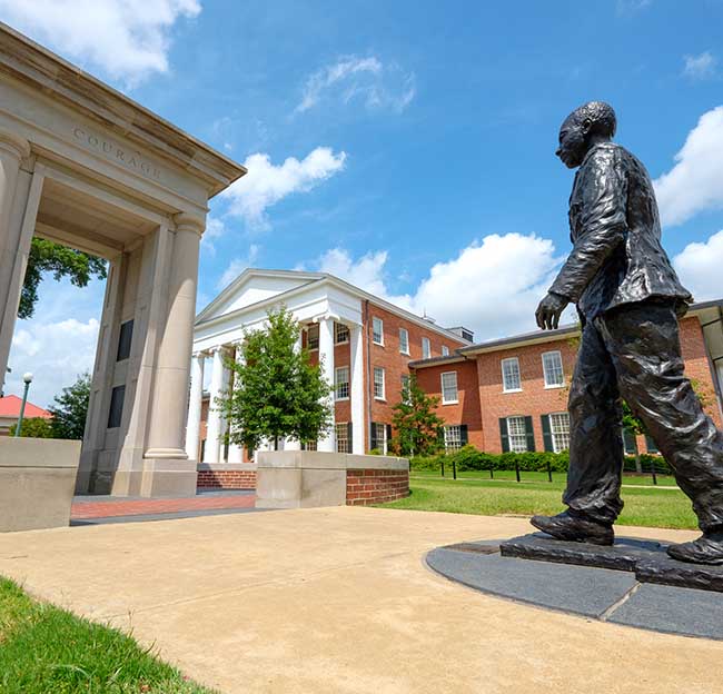 A picture of the James Meredith statue in front of the Lyceum.