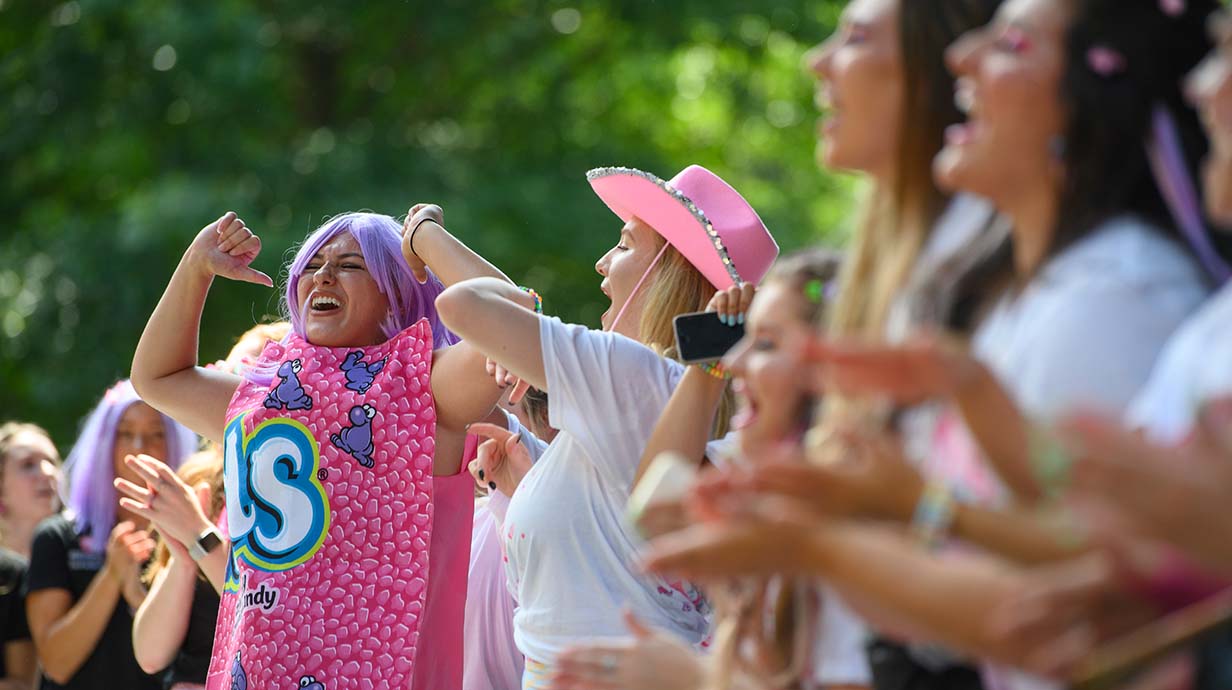 Ole Miss Sorority members perform for their potential new members on the Grove stage during Bid Day.