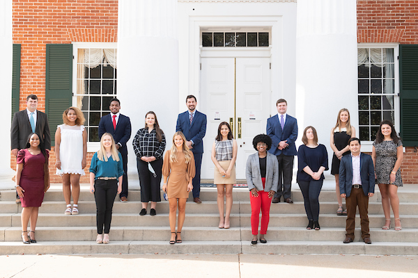 CEED scholars posing together on the steps of the Lyceum building