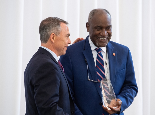 An Ole Miss alumnus receives an award.